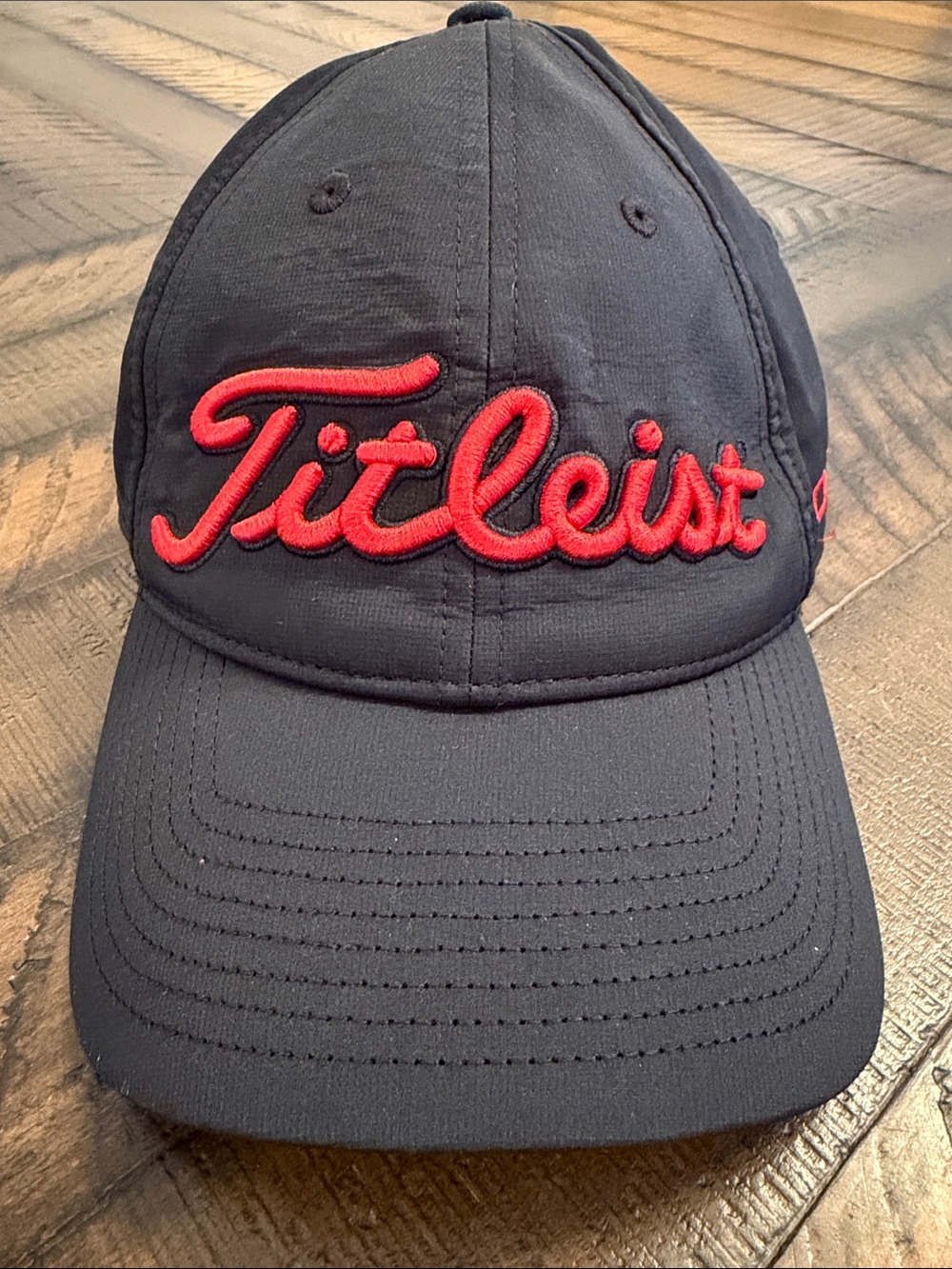 Titleist Black Cap with Red Script Logo